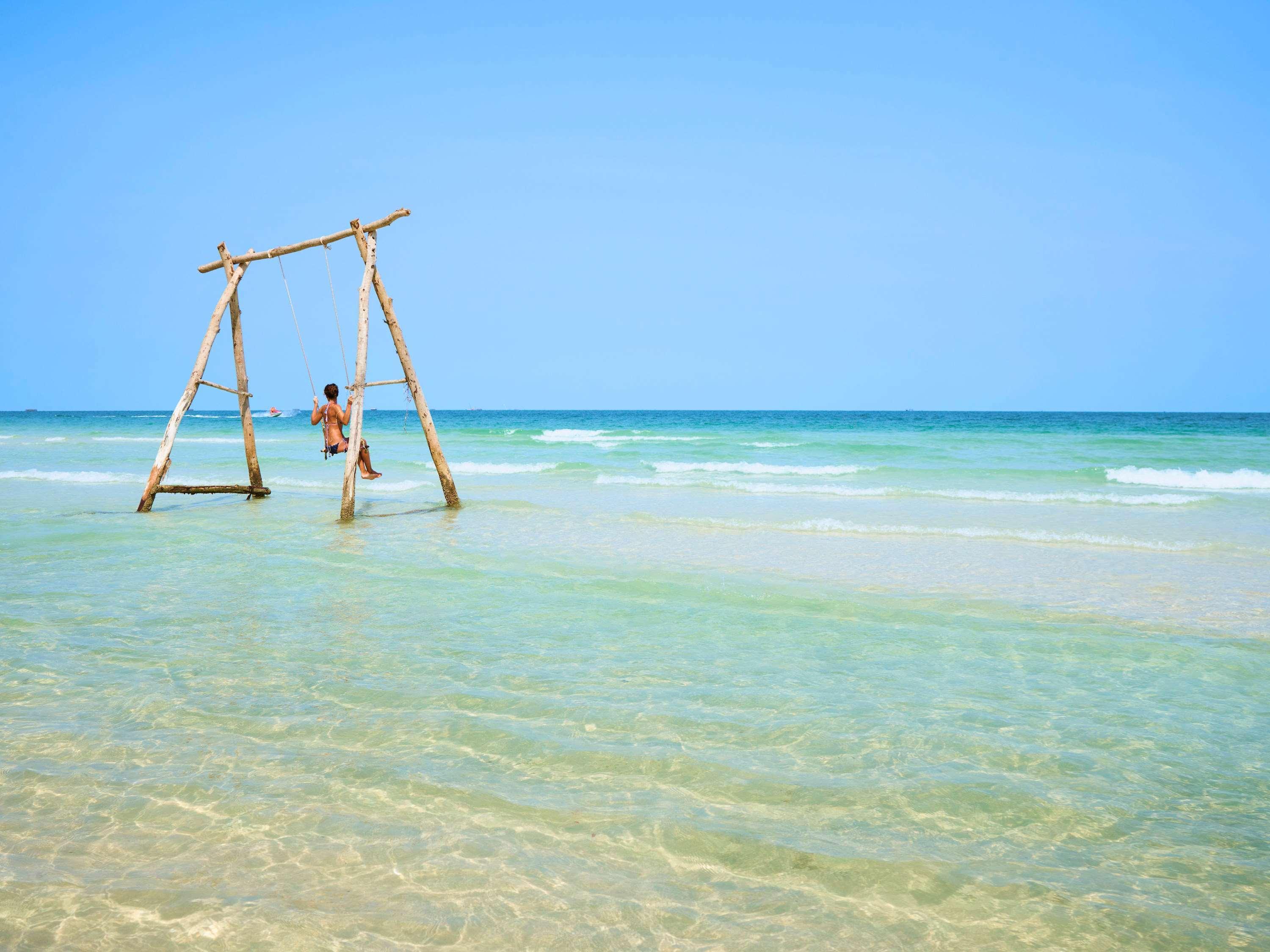 Moevenpick Villas & Residences دونغ دونغ المظهر الخارجي الصورة Swing at the beach