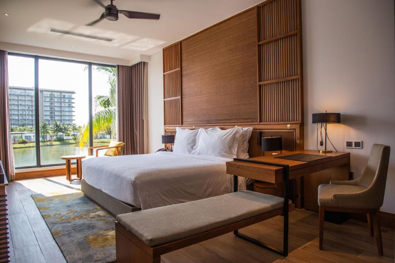 Moevenpick Villas & Residences دونغ دونغ المظهر الخارجي الصورة A bedroom at the hotel