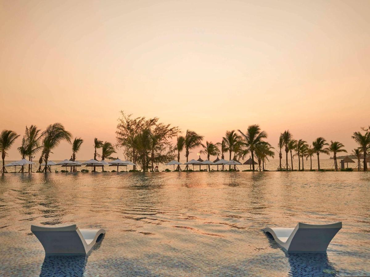 Moevenpick Villas & Residences دونغ دونغ المظهر الخارجي الصورة Sunset at the beach