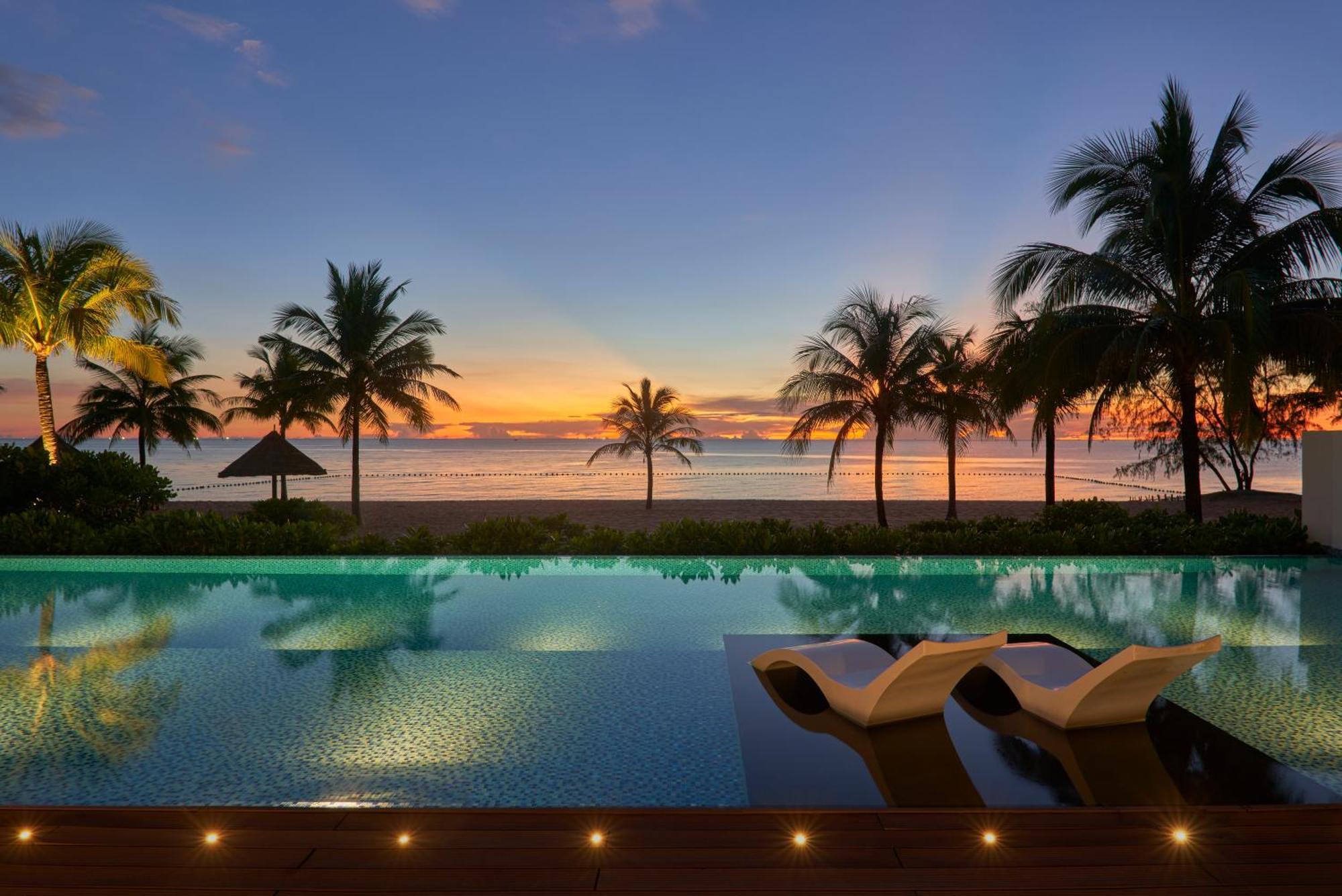 Moevenpick Villas & Residences دونغ دونغ المظهر الخارجي الصورة Sunset at the beach
