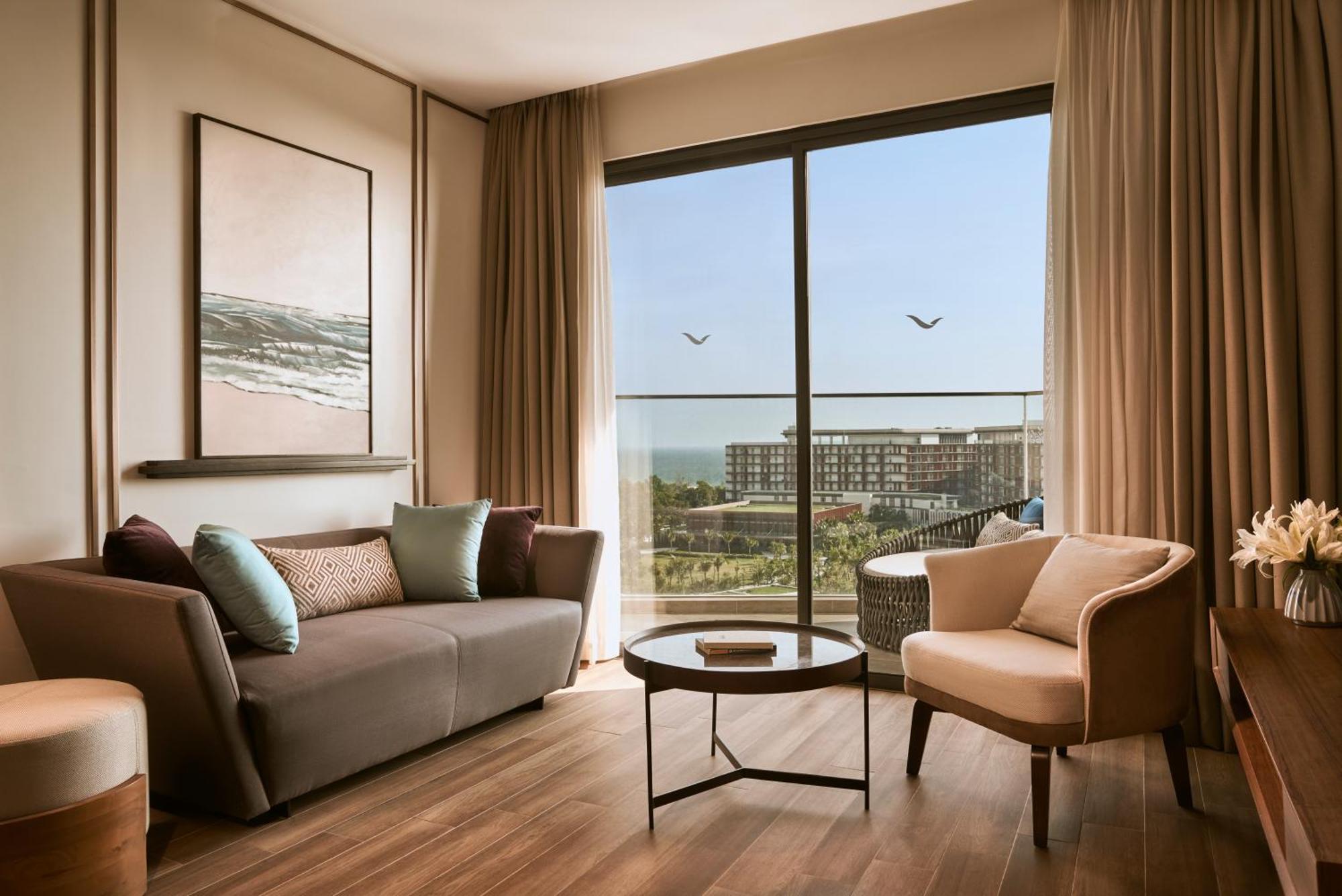 Moevenpick Villas & Residences دونغ دونغ المظهر الخارجي الصورة A living room at the hotel