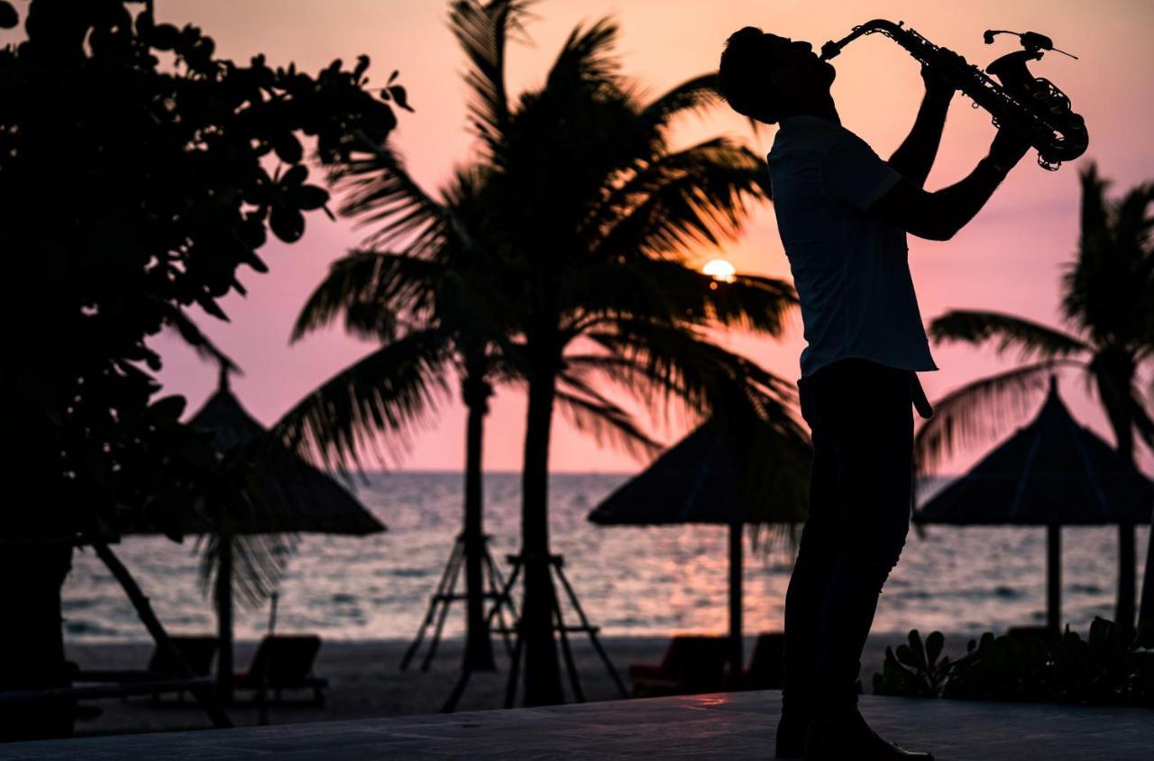 Moevenpick Villas & Residences دونغ دونغ المظهر الخارجي الصورة Sunset at the beach