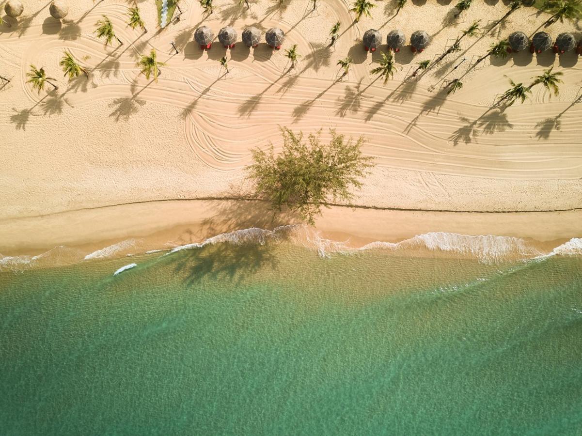 Moevenpick Villas & Residences دونغ دونغ المظهر الخارجي الصورة Aerial view of the beach